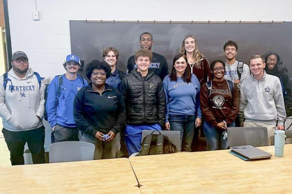 The students in the graduate level course taught by associate professor Justin Nichols, known as the Good Deeds Project.