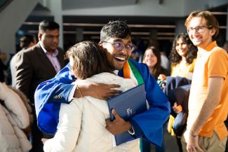 grad hugging family