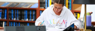 girl studying at library