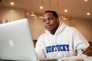 student working at home online