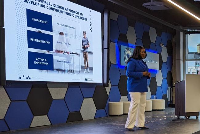 student presenting on stage 