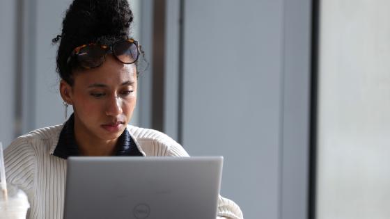 person on laptop working